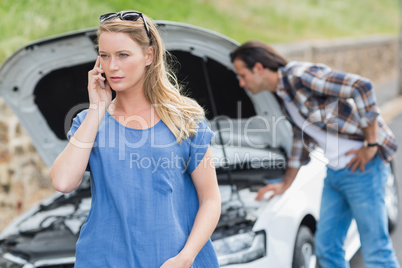 Couple after a car breakdown