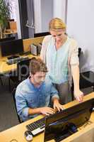 Students working on computer together