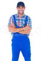 Male handyman standing arms crossed over white background