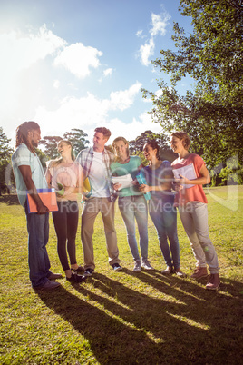 Happy students outside on campus