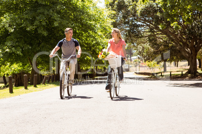 Happy couple on a bike ride