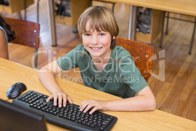 Cute pupil in computer class