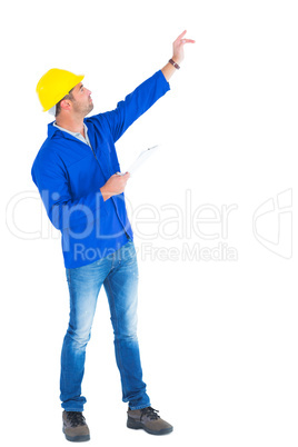 Supervisor with hand raised holding clipboard