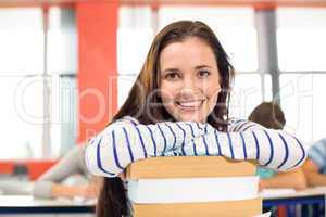 Smiling female student in classroom