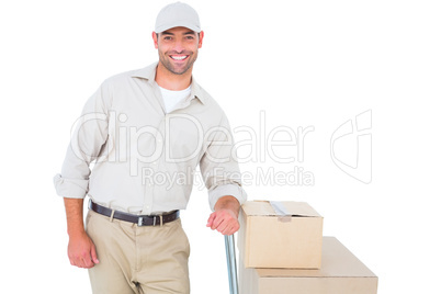 Confident delivery man with cardboard boxes Confident delivery man with cardboard boxes