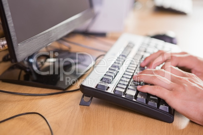 Student using computer in classroom