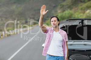 Man waving after a breakdown