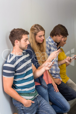 College students using cellphones