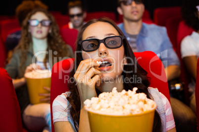 Young friends watching a 3d film