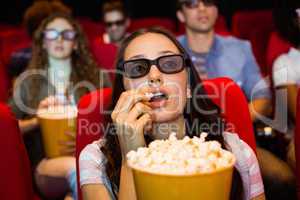 Young friends watching a 3d film