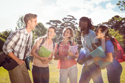 Happy students outside on campus