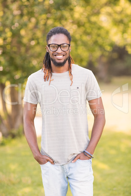 Handsome hipster smiling at camera