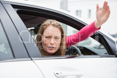 Young woman experiencing road rage