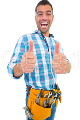 Excited handyman gesturing thumbs up