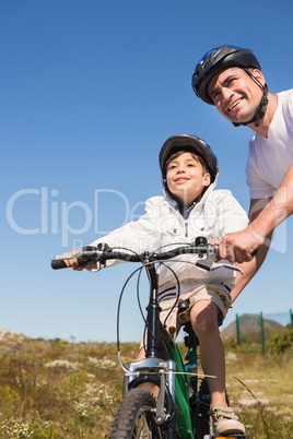 Father and son on a bike ride