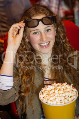 Young woman watching a 3d film Young woman watching a 3d film