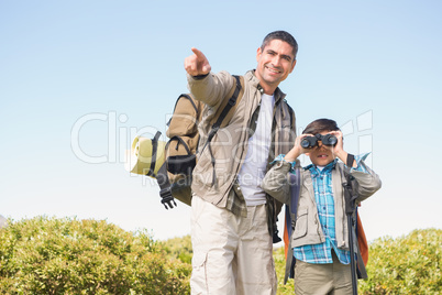 Father and son hiking in the mountains