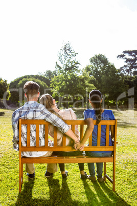 Man being unfaithful in the park