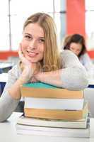 Smiling female student in classroom