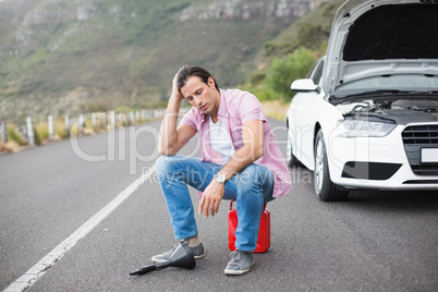 Stressed man after a car breakdown