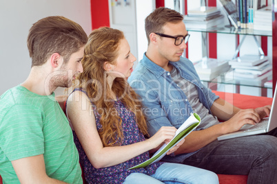 Fashion students looking at computer