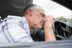 Drunk man slumped on steering wheel