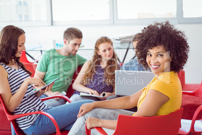 Fashion student smiling at camera