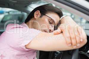 Drunk man slumped on steering wheel