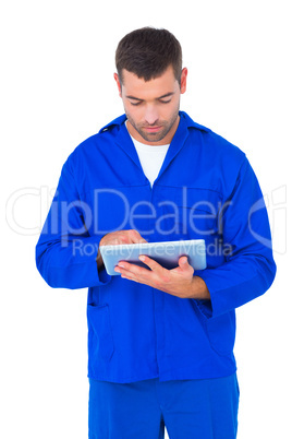 Mechanic using digital tablet on white background