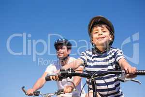 Father and son on a bike ride