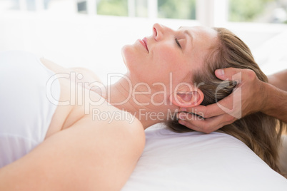 Woman receiving neck massage