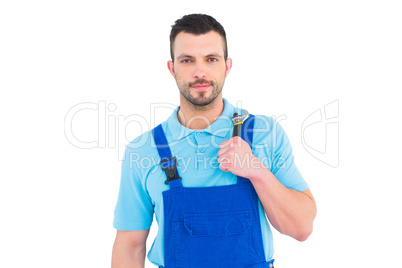 Repairman holding adjustable wrench