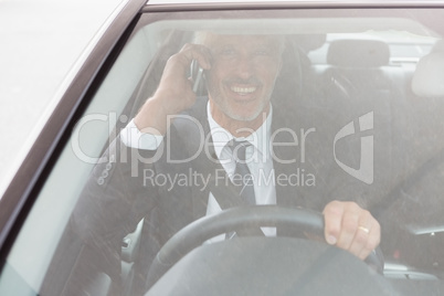 Smiling man sitting at the wheel