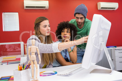 Team working at desk with colour samples