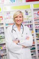 Smiling doctor with stethoscope and arms crossed