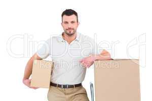Delivery man with trolley of boxes