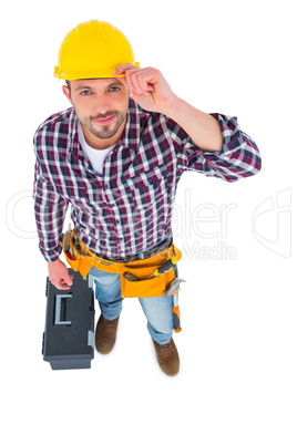 Smiling handyman with tool box
