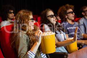 Young friends watching a 3d film