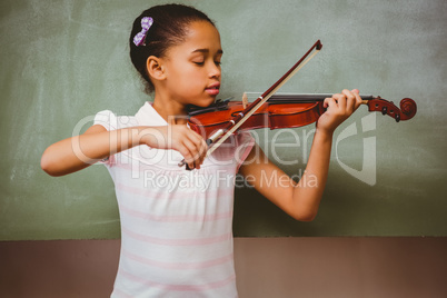 Portrait of cute little girl playing