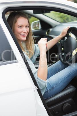Young woman in the drivers seat
