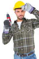 Handyman holding power drill