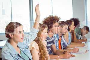 Fashion students being attentive in class