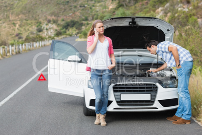 Couple after a car breakdown