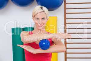 Blonde woman with massage ball