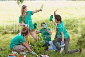 Happy friends gardening for the community