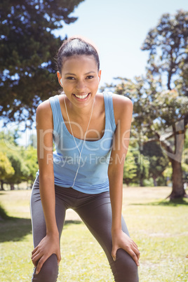 Fit woman taking a break in the park