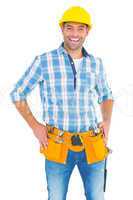 Confident handyman standing with hands on hips