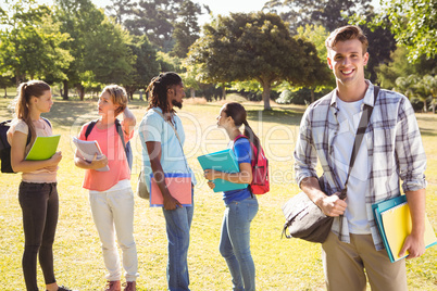 Happy students outside on campus