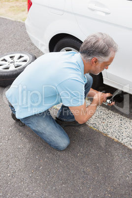 Man fixing tire
