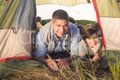 Father and son in their tent